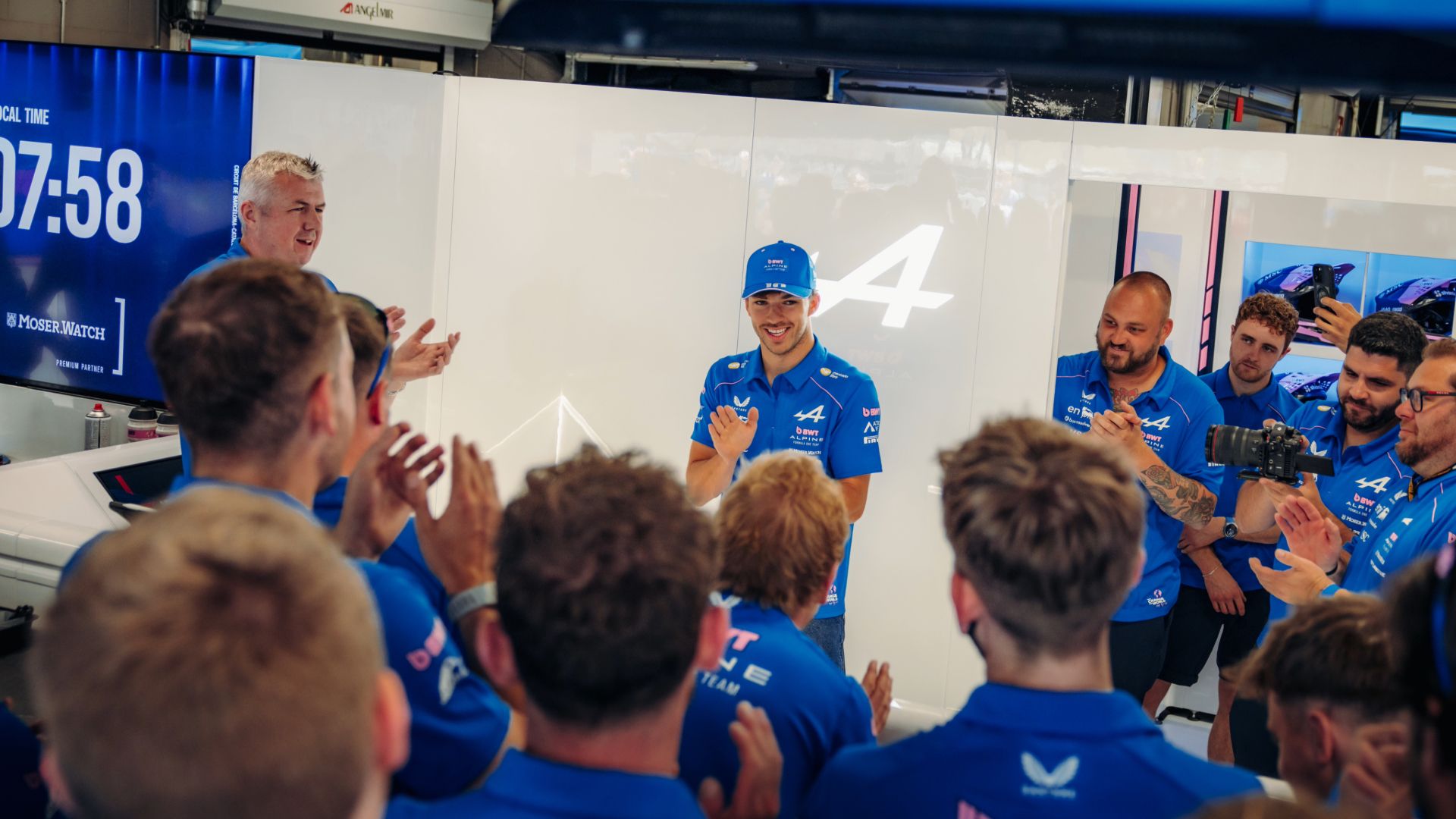 Pierre celebrates with garage.jpg
